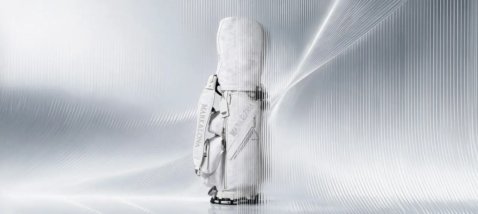 White moiré-camo CODE stand bag against a silver backdrop