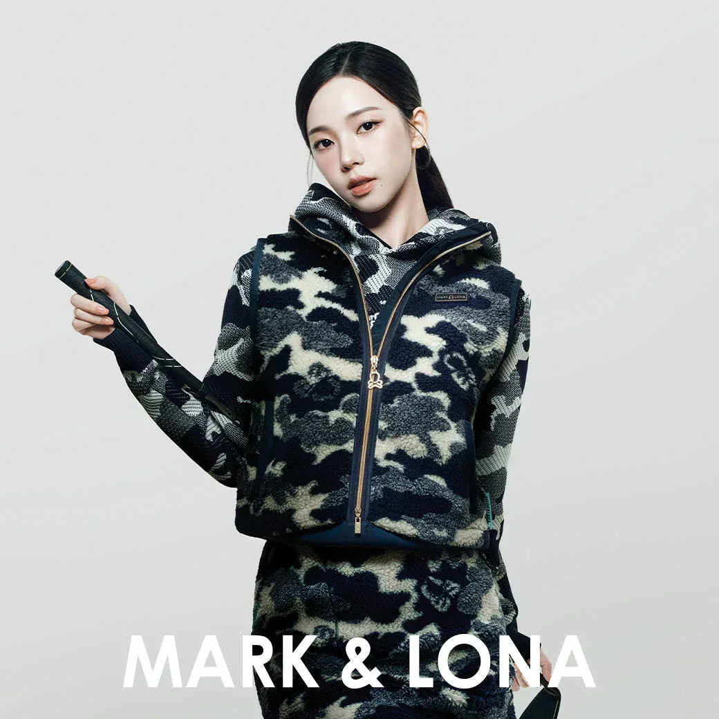 KARINA in a navy camo boa fleece vest and hoodie